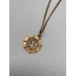 A 9ct gold St. Christophers pendant with a 9ct gold necklace. [50cm in length] [4.63grams]