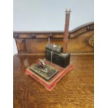 A Vintage tin plate German made steam engine. [33x23.5x20cm]