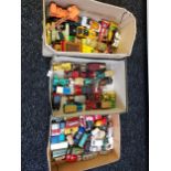 Three trays containing a collection of vintage playworn matchbox models
