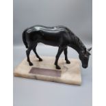 An Art Nouveau Spelter horse figurine, Designed with a green patina coat, marble base and silver