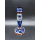 A Doulton Lambeth ornate candlestick. Signed E.S. [20cm in height]