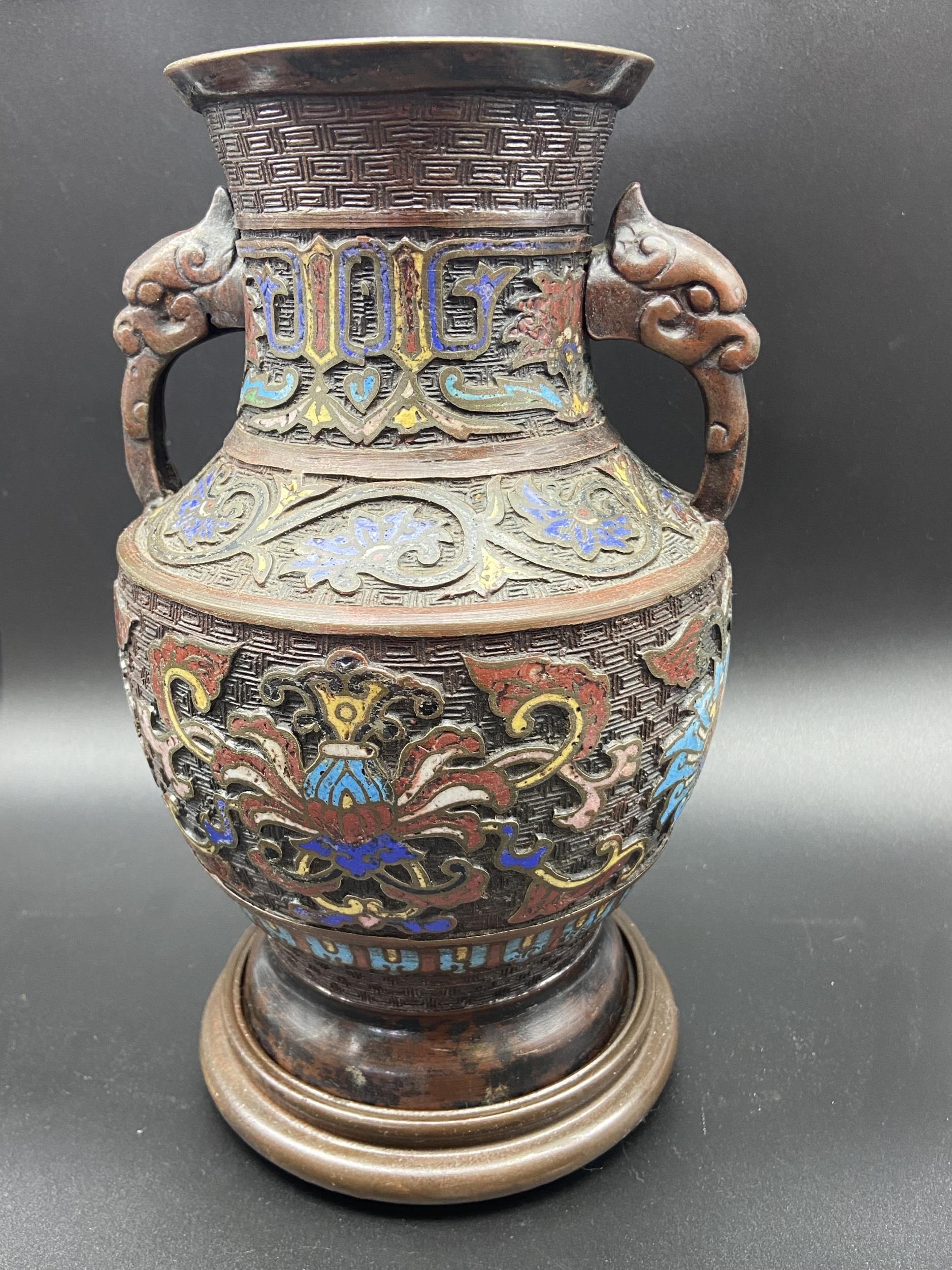 A 19th century Japanese bronze Champleve Enamel Cloisonne urn vase. Comes with wooden stand. [26cm - Image 5 of 7