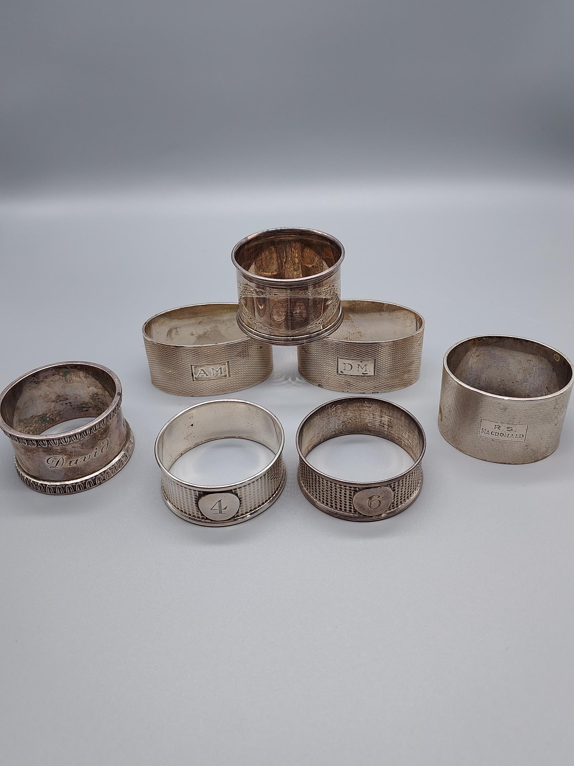 A Lot of 7 various silver hallmarked napkin rings. [264grams]