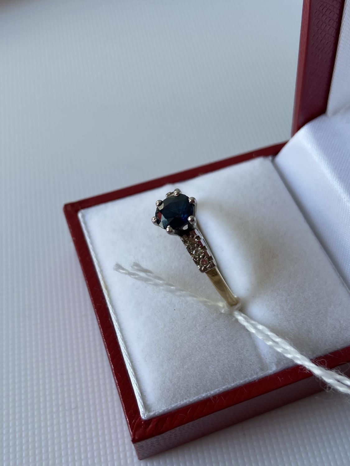 An 18ct gold sapphire and 6 diamond stone ring [size S] [2.59g] - Image 4 of 8