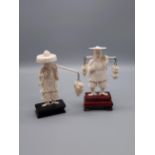 Two bone carved Chinese figurines sat upon hardwood stands. [Tallest 10cm]