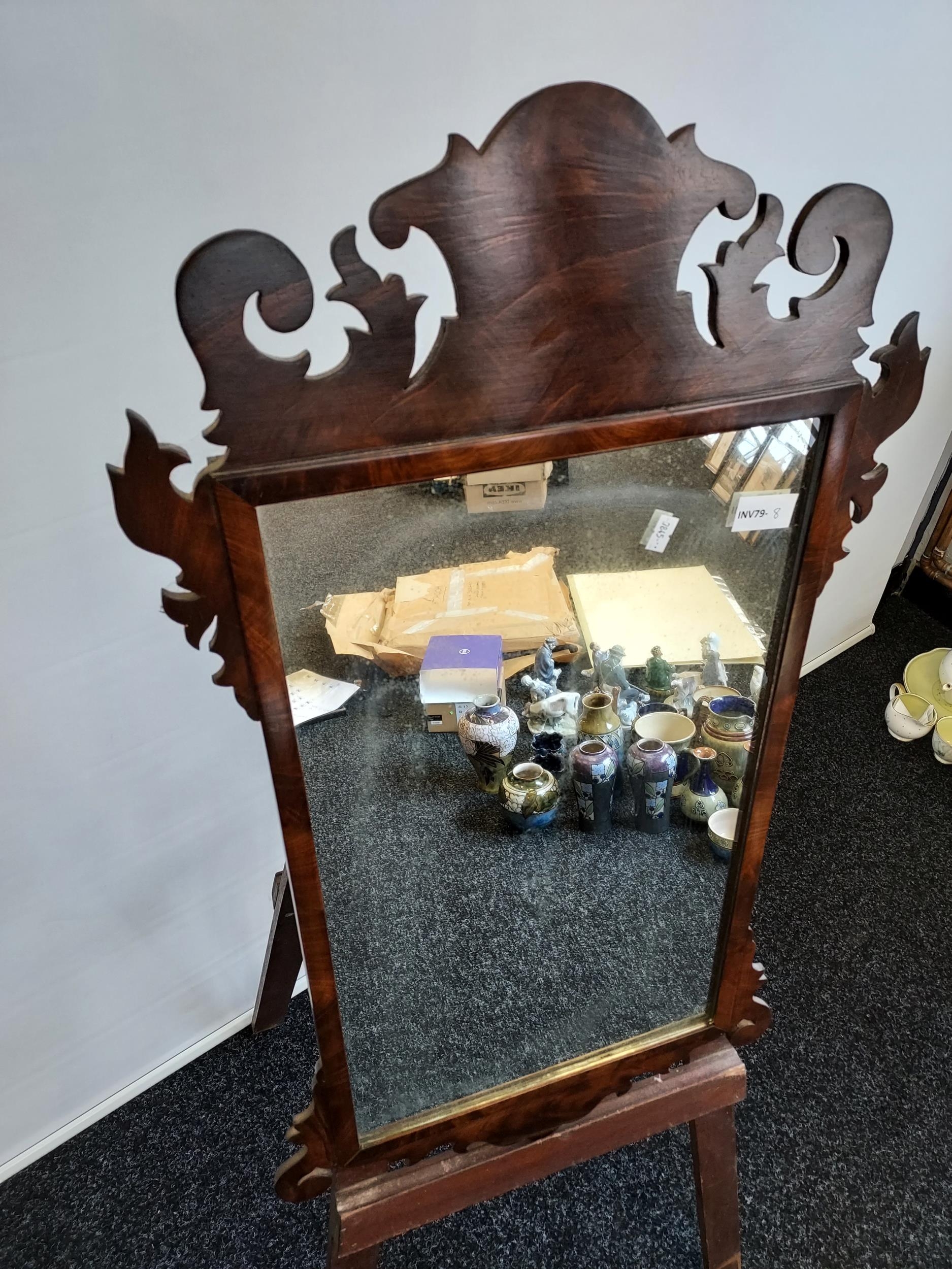 A Georgian mahogany framed mirror. In a Chippendale style, shaped crested top top and bottom [80cm - Image 3 of 3