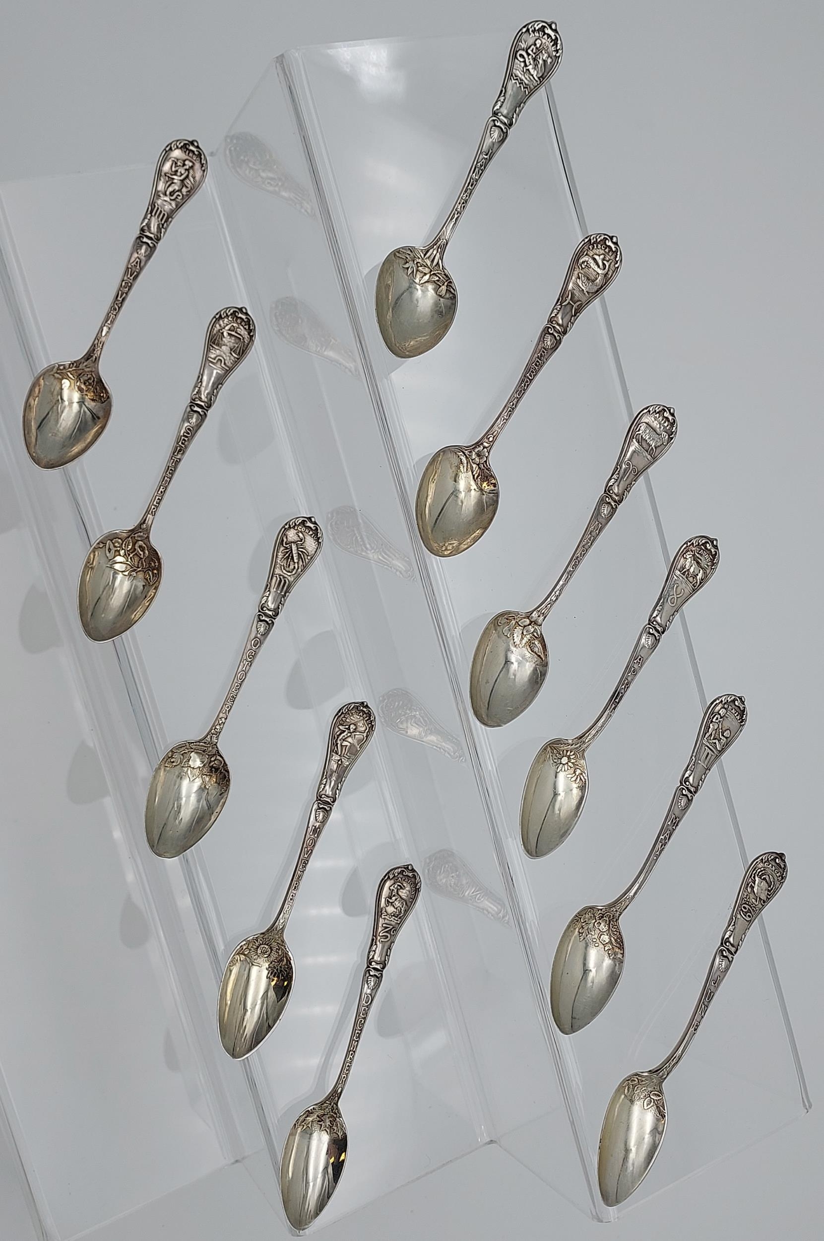 A Lot of 11 Birmingham silver star sign design tea spoons. Produced by Levi & Salaman, dated