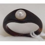 Antique 18th/ 19th century horn ring set with a single pearl.