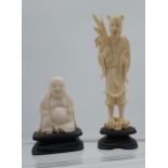 An early 1900's hand carved ivory sitting buddha on a hardwood stand, together with a hand carved