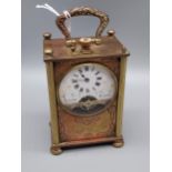 An Early 20th century French 8 Jours carriage clock. with raised relief figure panels. [8.5x5.5x4cm]