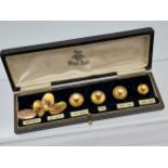 A Box set of vintage 9ct gold cuff links and studs. 'The OP Stud Set' [8.61grams]