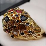 A Beautifully made 14ct gold and precious gem stone ring. To include Sapphires, garnet, emerald