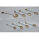 7 various white metal tea Spoons from Zanzibar, together with one other white metal spoon.