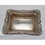 A Birmingham silver ornate trinket dish. Produced by William Neale and dated 1910. [2x9.5x7.5cm]