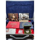 A Case of loose coins together with various The Royal Mint coinage. Includes A Timeless First The