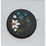 A Victorian yellow metal and Pietra Dura mosaic floral design brooch.
