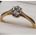 An Early 20th century 18ct gold and Platinum diamond ring. 0.50ct diamond. [Ring size O] [2.47Grams]