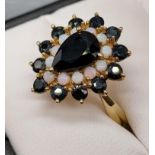 A Beautiful example of a ladies 9ct gold, Sapphire and opal tear drop cluster ring. [Ring size P] [