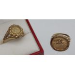 A 9ct gold ring set with a pure gold Guardian angel coin insert. Together with a 9ct gold St. George