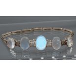 A Nice example of a vintage white metal and moon stone or opalescent set bracelet. [17.5cm in