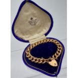 An Antique 9ct gold curb bracelet with original box, [15cm in length] [Weighs 24.02grams]