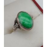 A Sterling silver and jade ring, [Ring size E]