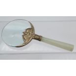 An Antique Chinese jade handle magnifying glass. Designed with a white metal neck support. [13.2cm