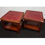 A Pair of Red leather top side tables. [52x61x61cm]