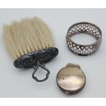 A Birmingham silver snuff box, Sterling silver napkin ring and Birmingham silver clothes brush