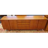 A Mid century teak hand made Scandinavian style sideboard. Consists of four doors and four