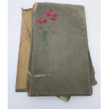 Antique postcard album containing a quantity of old postcards