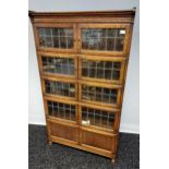 Antique Minty Limited Barristers sectioned bookcase. Designed with glass and lead panel doors. [