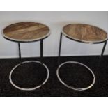 A Pair of contemporary Bespoke chrome & driftwood side tables. [52cm in height and 40cm in diameter]