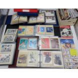 A Large collection of Postcard albums, First day covers, cigarette cards and stamps etc