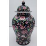 A Large 20th century Chinese floral design temple jar with lid. [49cm in height]