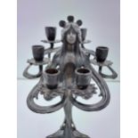 A Large Bronze Art Nouveau Candelabra centrepiece. In the form of a lady bust holding six candle
