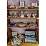 Four shelves of various silver plated and E.P Wares. To include cutlery, tea caddy, serving