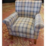 A Contemporary tartan style arm chair.