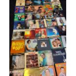 A lot of records to include; Queen, Tony Christie, Kenny Rogers, Neil Diamond, Elvis, Abba etc