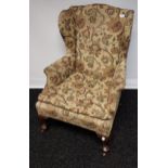 A Nice example of a 19th century wing back arm chair.
