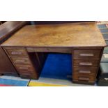 Antique solid oak knee hole school desk. Designed with 9 drawers. [76x137x75cm]