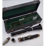 Antique clarinet with travel case