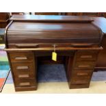 Antique Roll Top Writing Desk. 'Angus Menstrie' designed with four drawers to either side and a