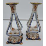 A Pair of French Faience candlesticks circa 1900. [24cm in height]