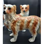 A Pair of Bo'ness pottery mantle dogs with glass eyes. [29cm in height]