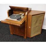 An Art Deco style cabinet fitted with a Garrard AT6 Turntable. Together with large corner speaker.