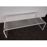 A Stylish Contemporary Perspex table. [35x121x59cm]