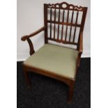 A Georgian arm chair with spindle back and square tapered legs