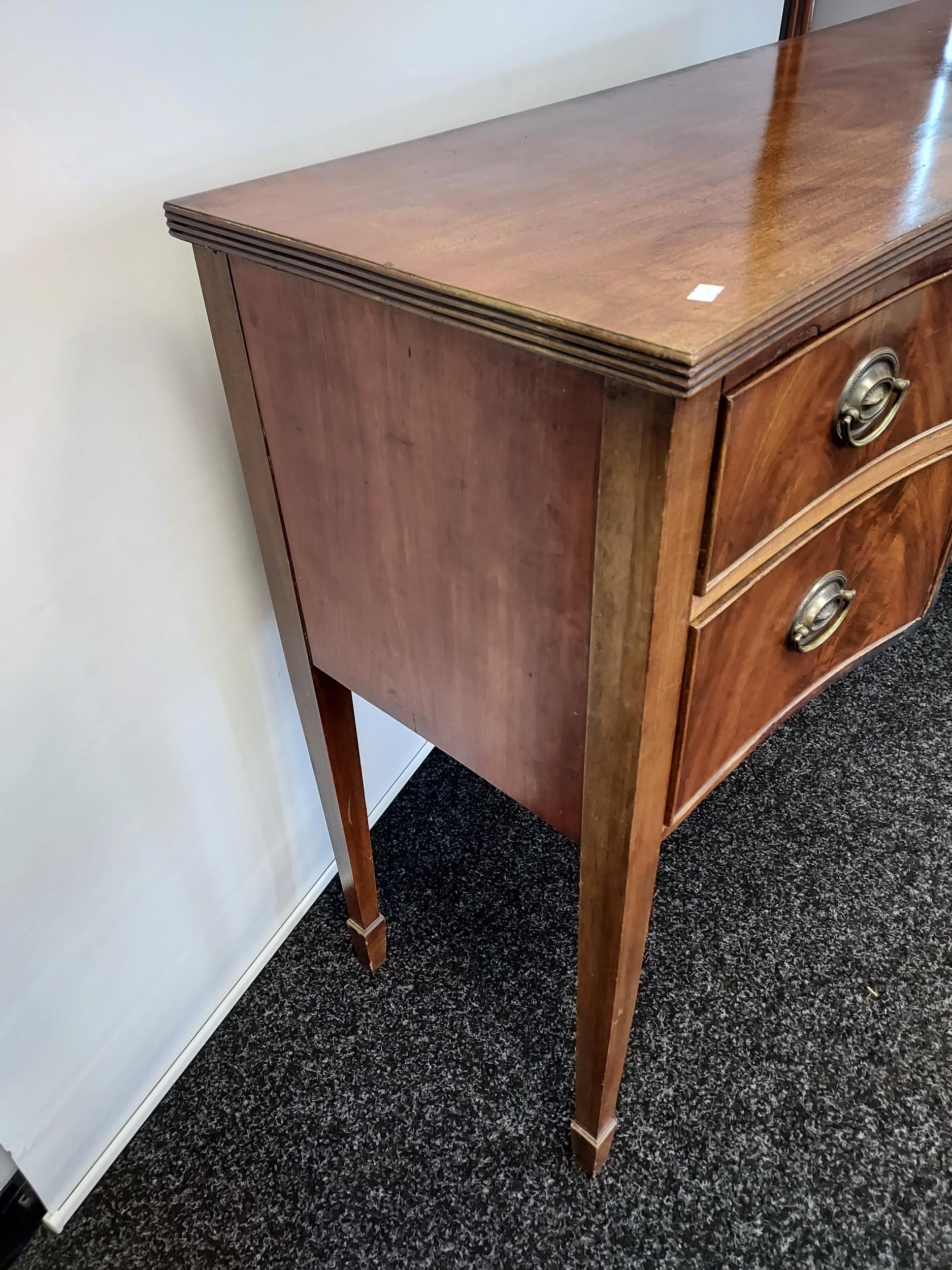 A Georgian sideboard supported on square tapered legs. [94x139x49cm] - Image 3 of 6
