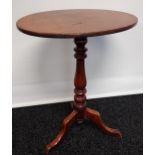 A 19TH century single pedestal wine table. [70cm in height]